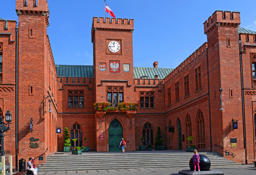 Bestaunen Sie das alte Rathaus von Kolberg. 