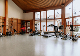 Powern Sie sich im Fitnessraum des Hotels ordentlich aus!