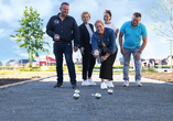 Messen Sie sich bei einer Partie Boule im Wangerland Resort. 