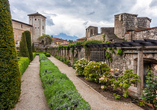 Schlendern Sie beim Besuch des Castello del Buonconsiglio durch den prachtvollen Schlossgarten im Renaissance-Stil.